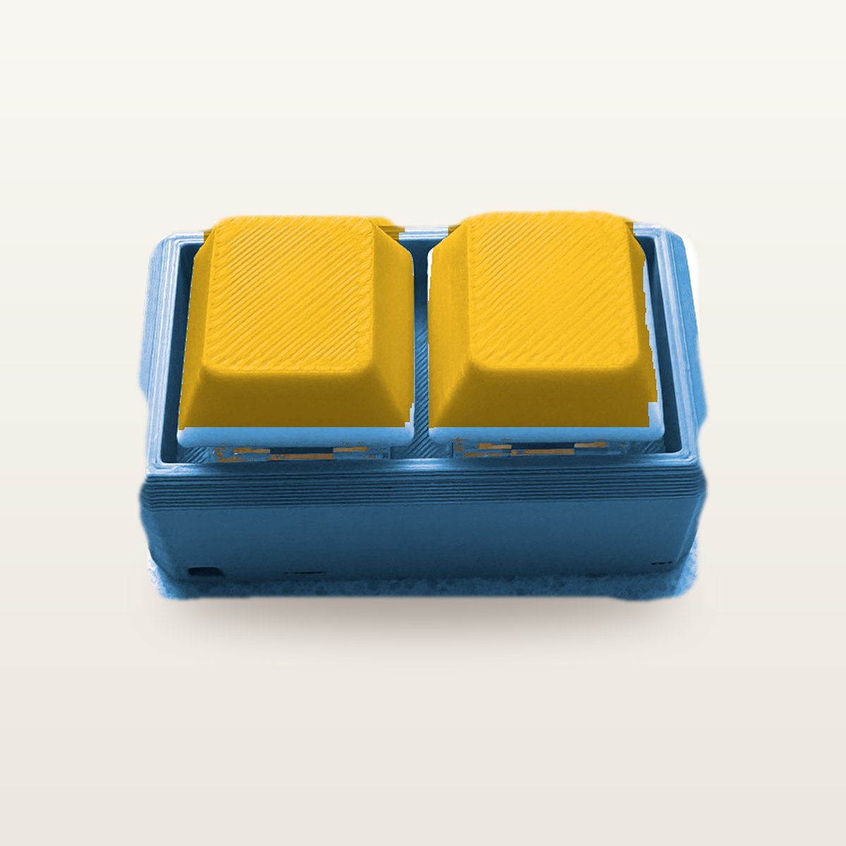 Clickey Duo met blauwe basis en gele keycaps