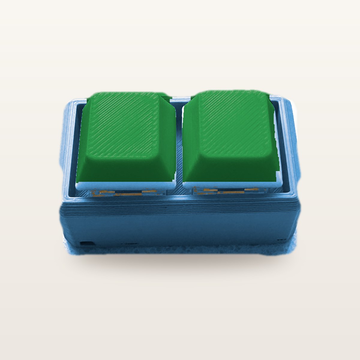 Clickey Duo met blauwe basis en groene keycaps