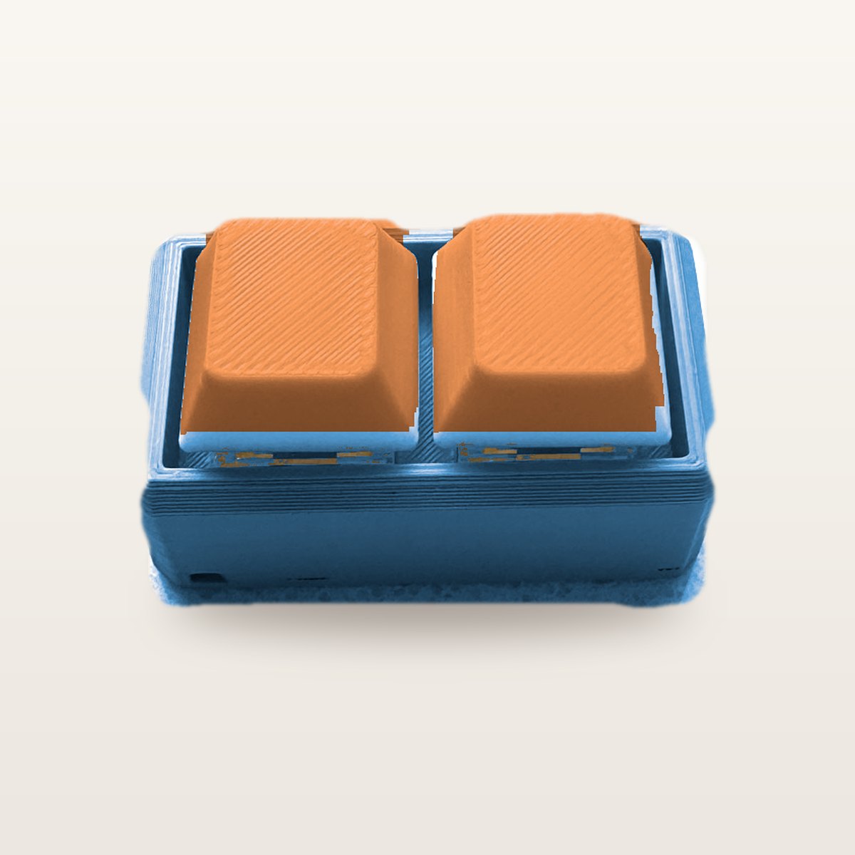 Clickey Duo met blauwe basis en oranje keycaps