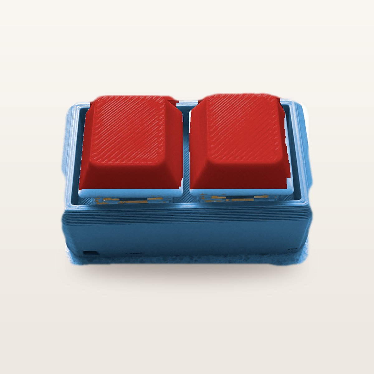 Clickey Duo met blauwe basis en rode keycaps
