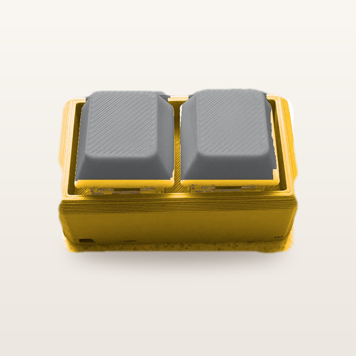 Clickey Duo met gele basis en grijze keycaps