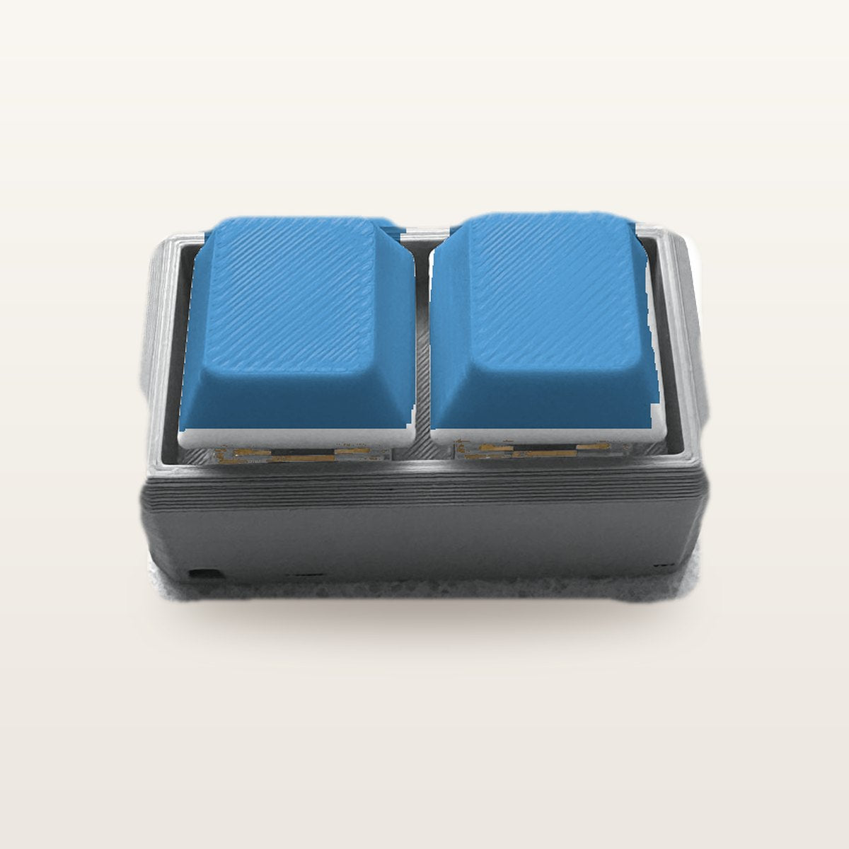 Clickey Duo met grijze basis en blauwe keycaps