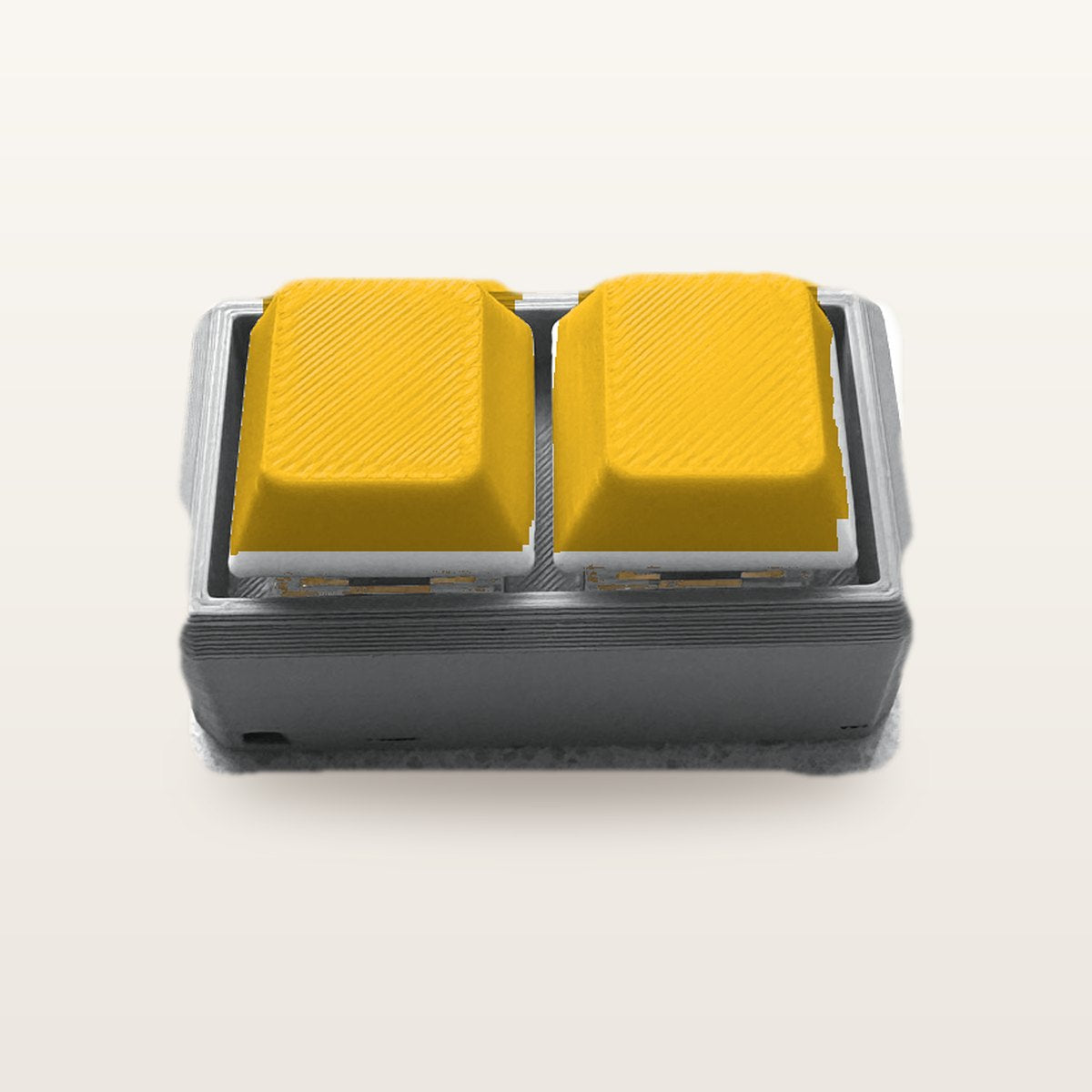 Clickey Duo met grijze basis en gele keycaps