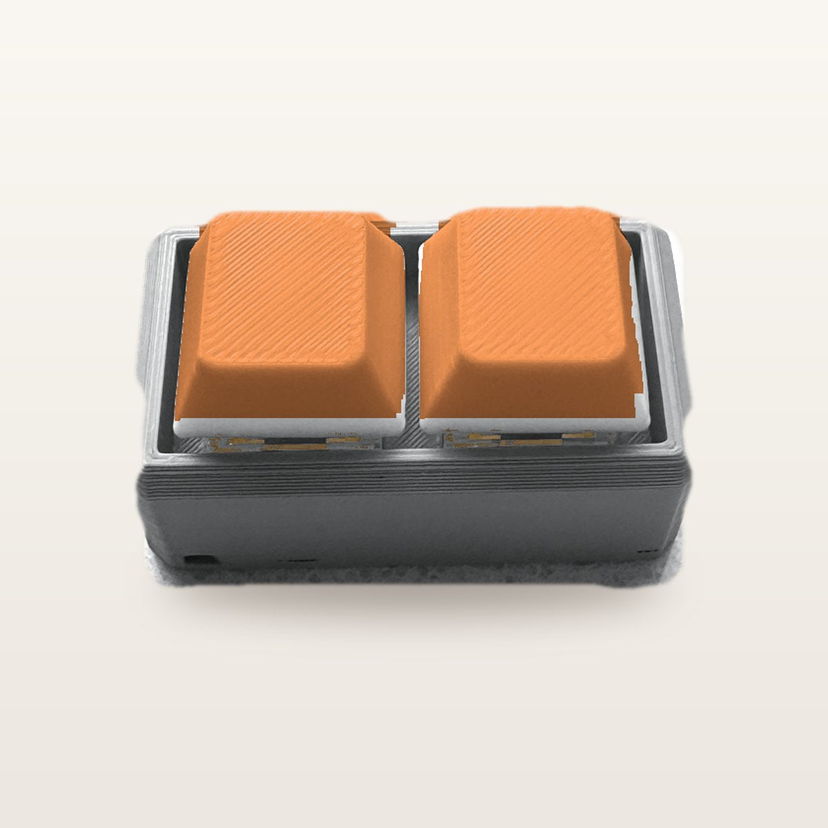 Clickey Duo met grijze basis en oranje keycaps