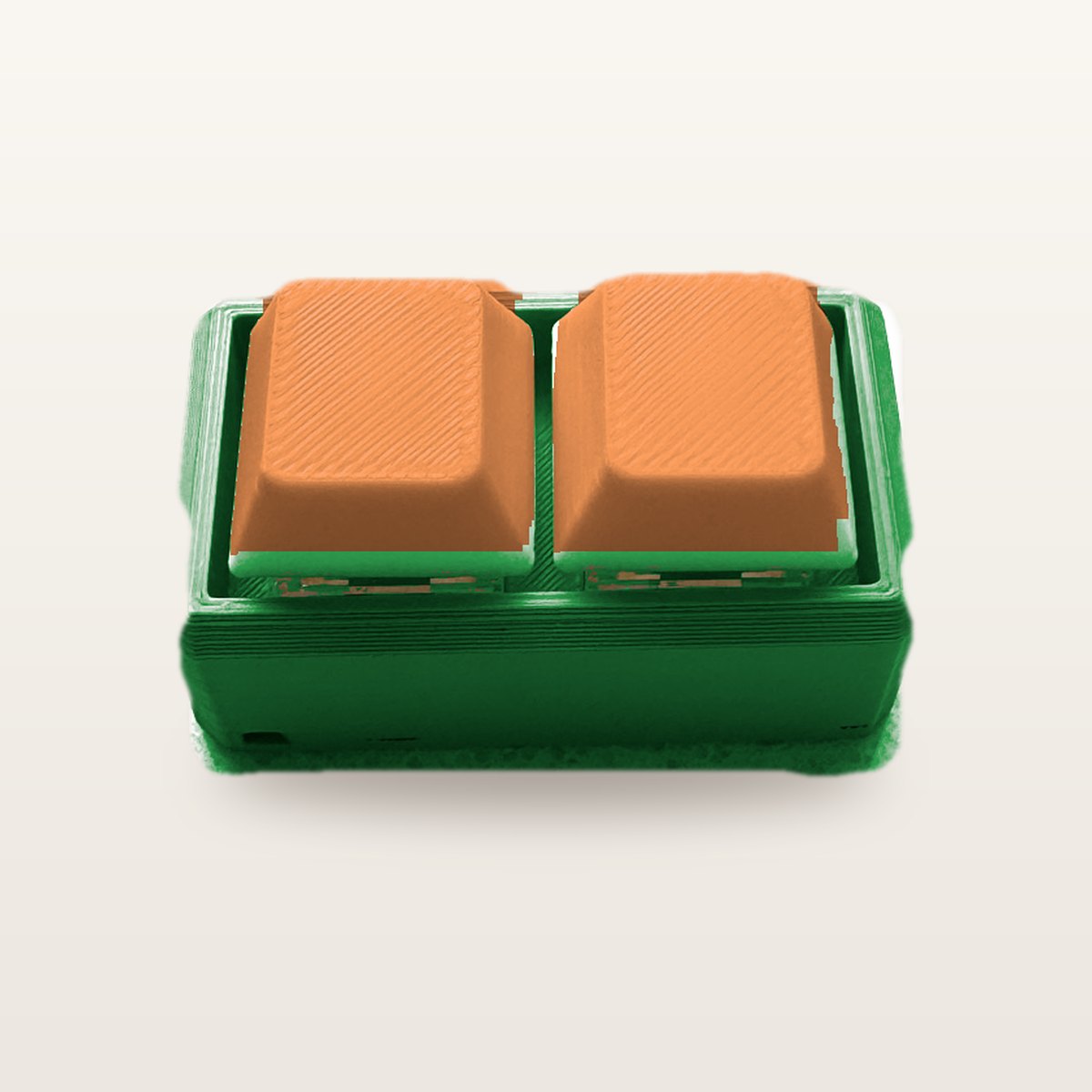 Clickey Duo met groene basis en oranje keycaps