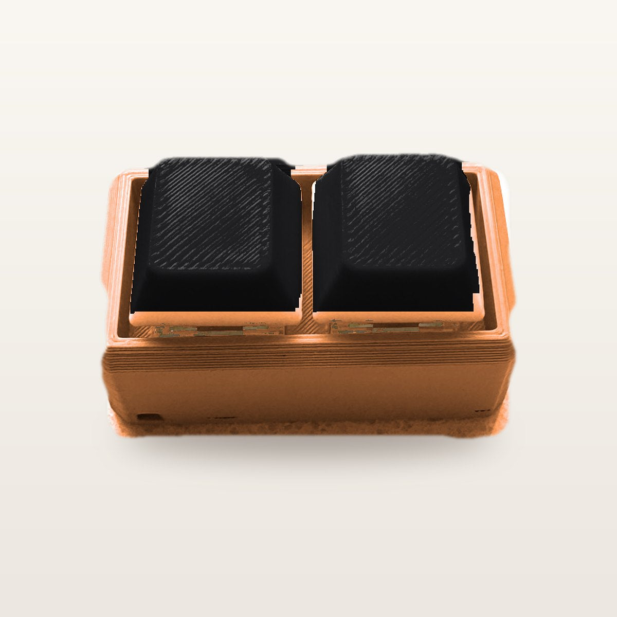 Clickey Duo met oranje basis en zwarte keycaps