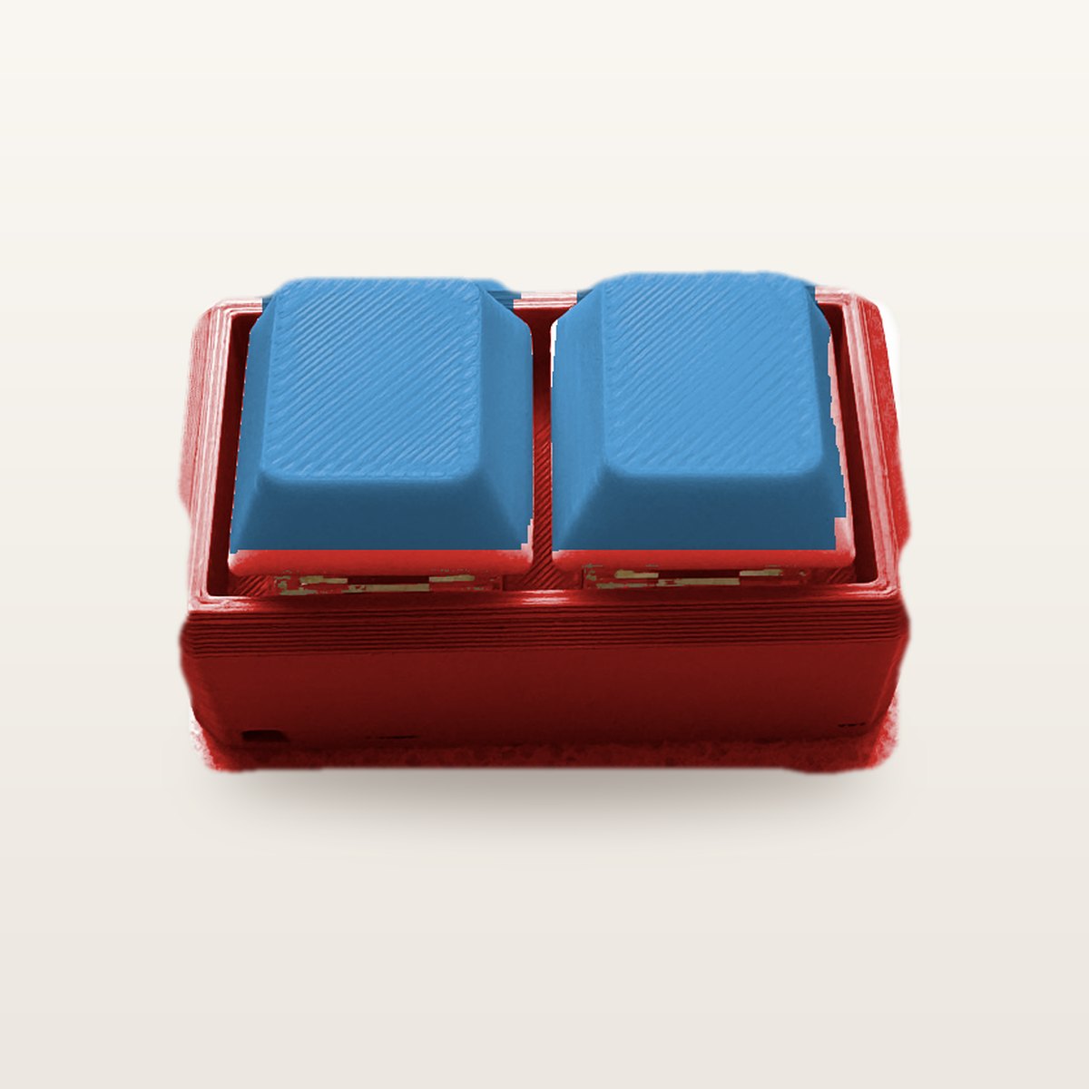 Clickey Duo met rode basis en blauwe keycaps