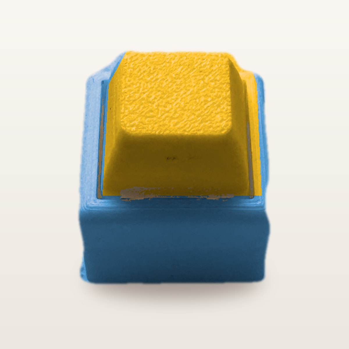 Clickey Mono met blauwe basis en gele keycaps