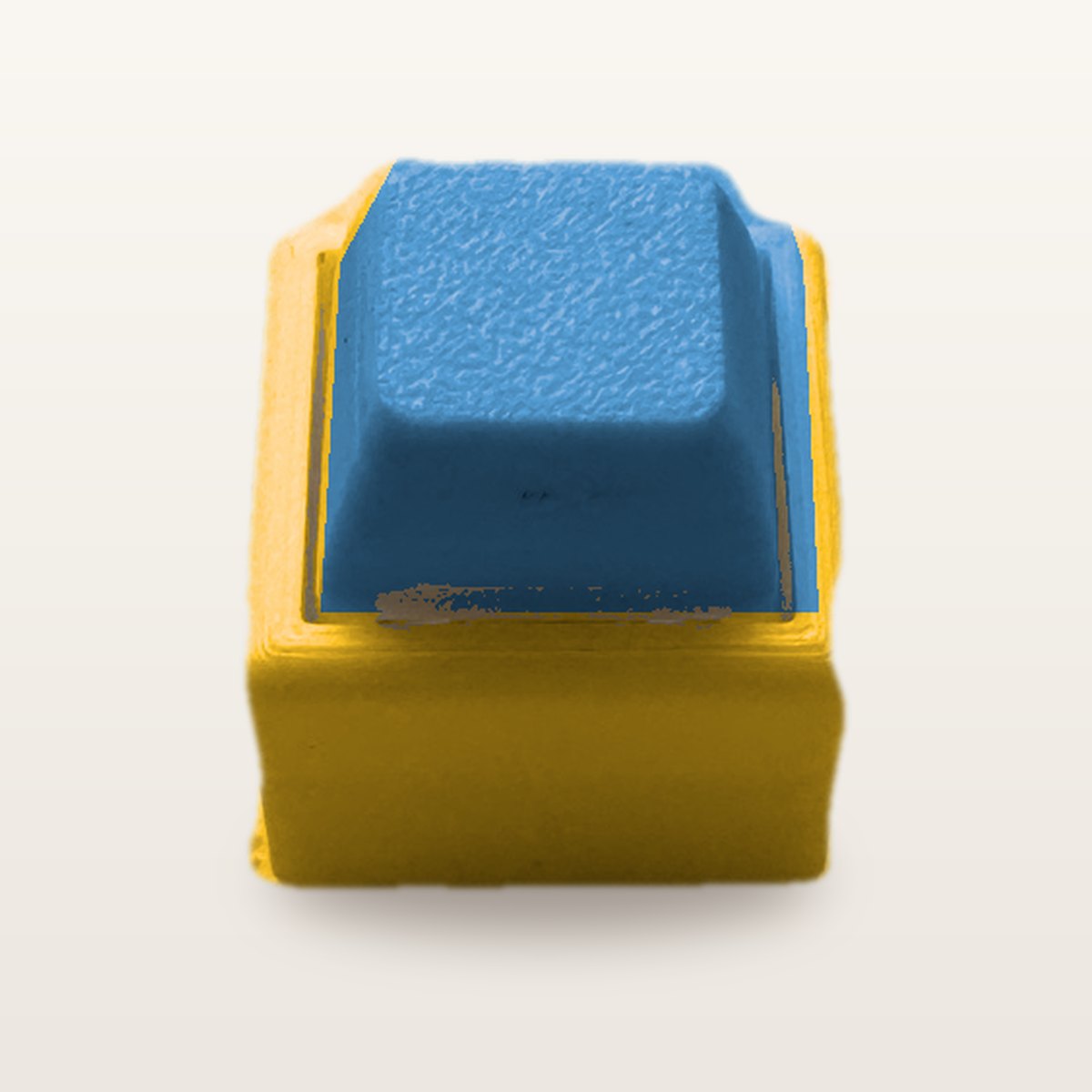 Clickey Mono met gele basis en blauwe keycaps