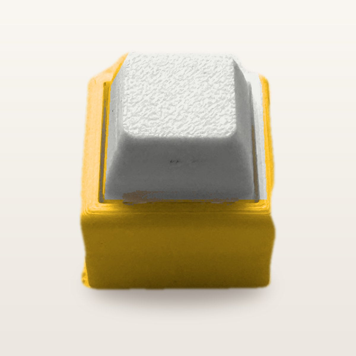 Clickey Mono met gele basis en witte keycaps