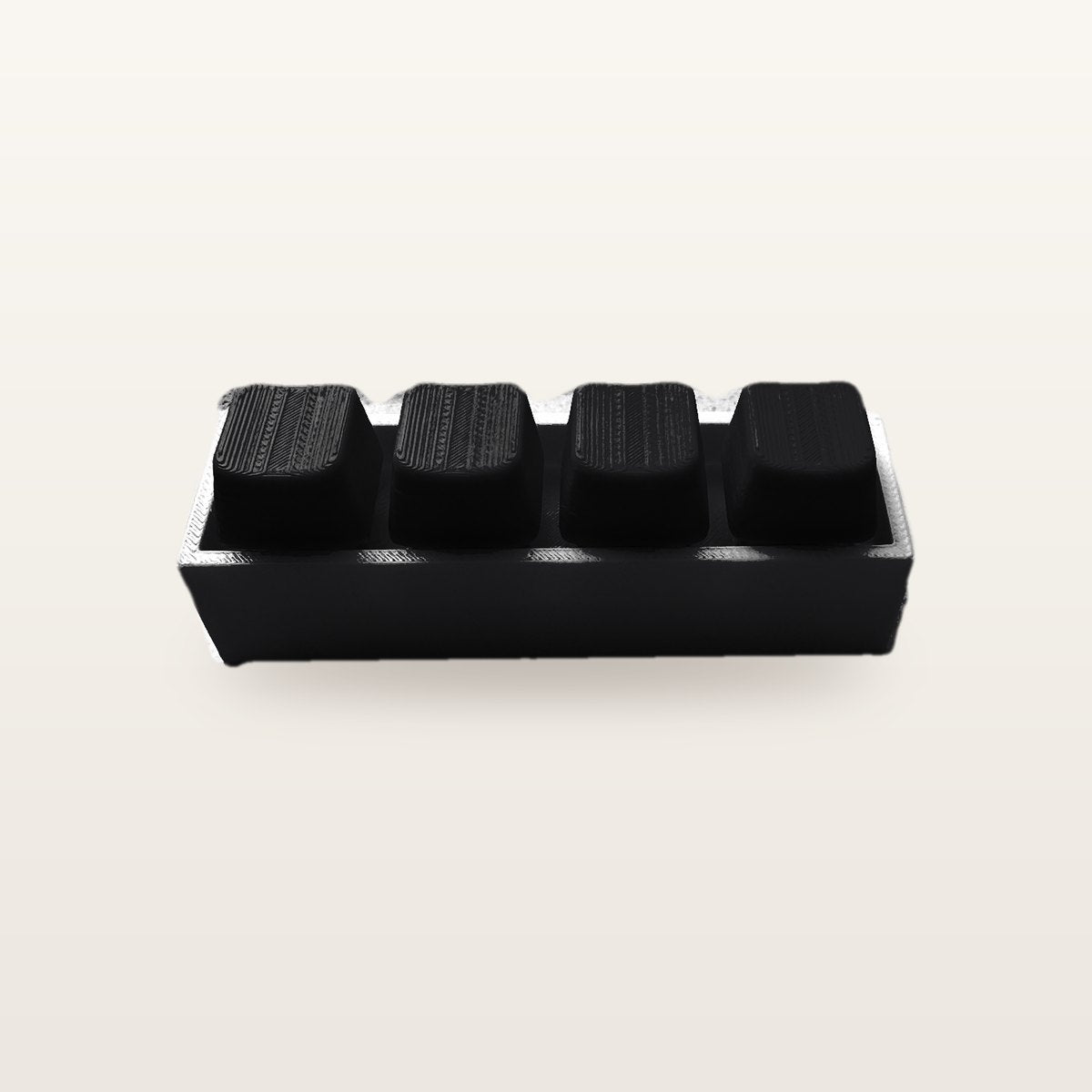 Clickey Royal Four met zwarte basis en zwarte keycaps