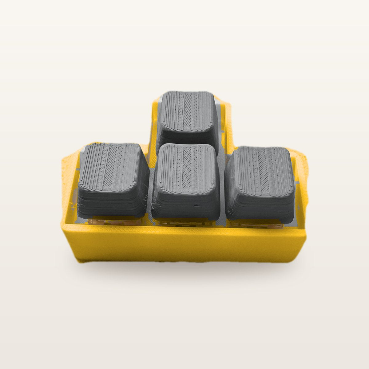 Clickey WASD met gele basis en grijze keycaps