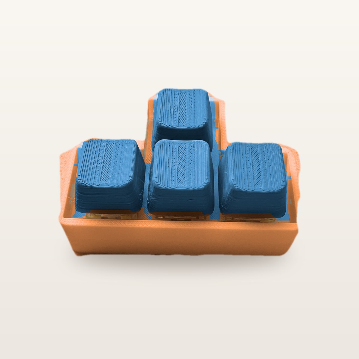 Clickey WASD met oranje basis en blauwe keycaps